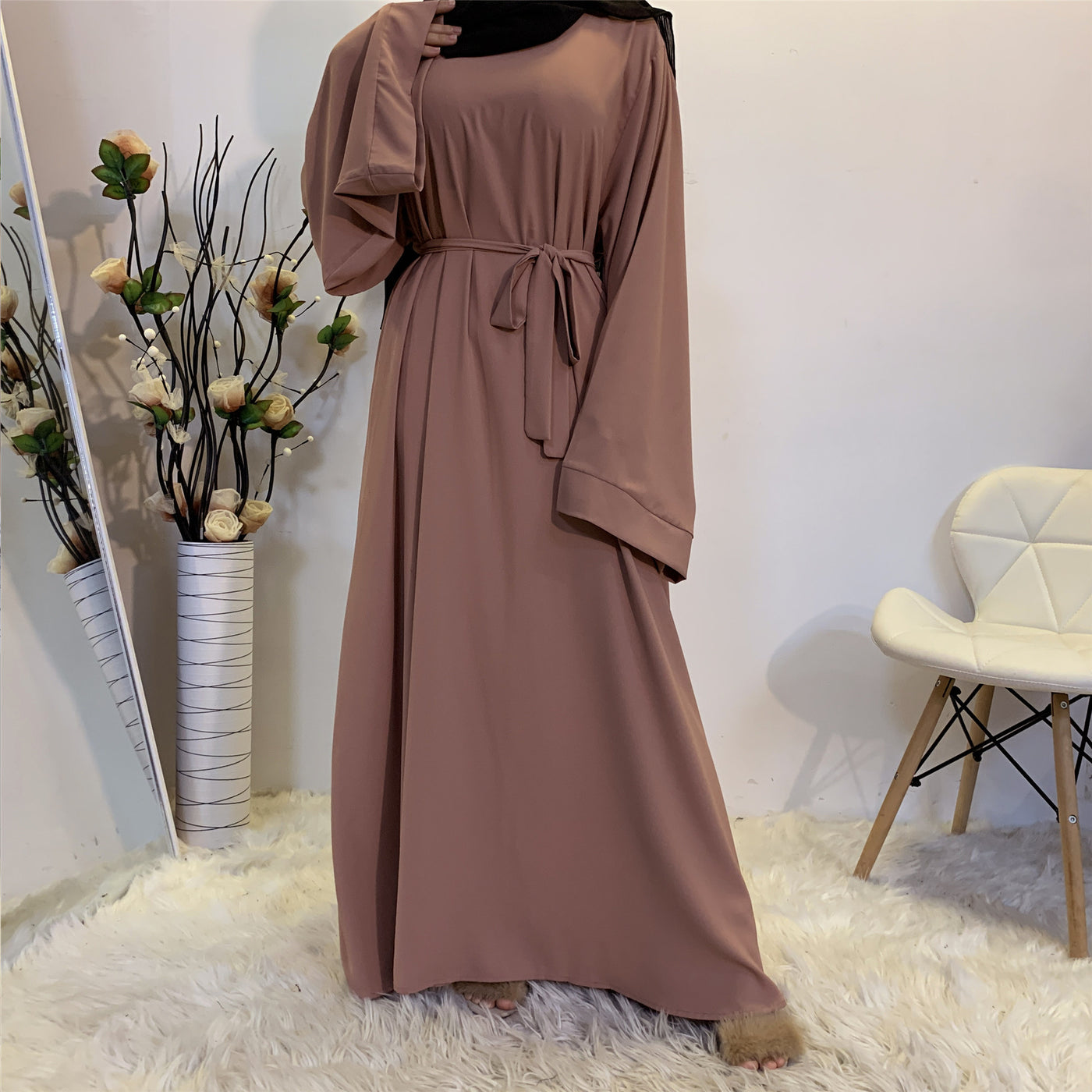 "Modest Chic: Muslim Female Dress for Fashionable Elegance"