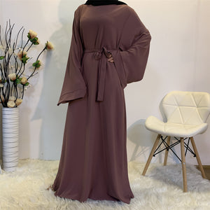 "Modest Chic: Muslim Female Dress for Fashionable Elegance"